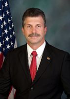 Official portrait of David Maloney