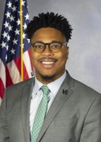 Official portrait of Malcolm Kenyatta