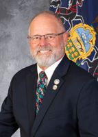 Official portrait of Bud Cook