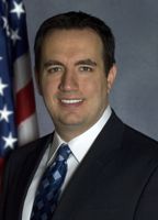 Official portrait of Frank Burns